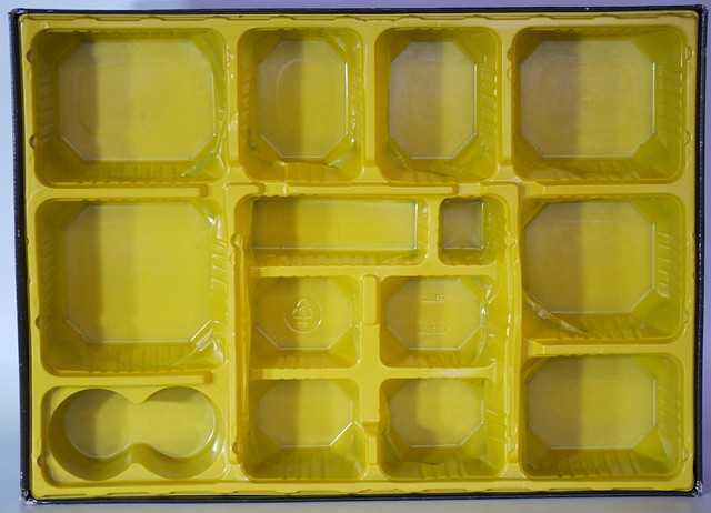 The 14 compartments you're meant to sort the parts into